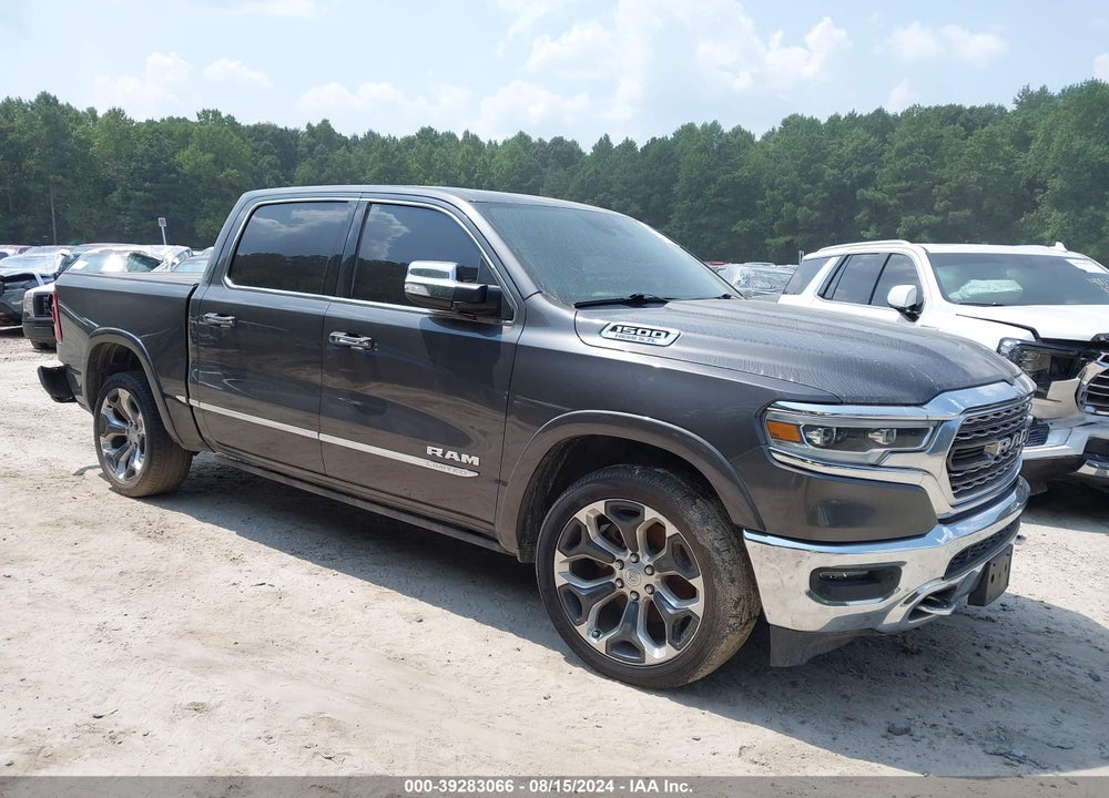 2019 RAM 1500 LIMITED 4X4 5'7 BOX VIN: 1C6SRFHT4KN834950