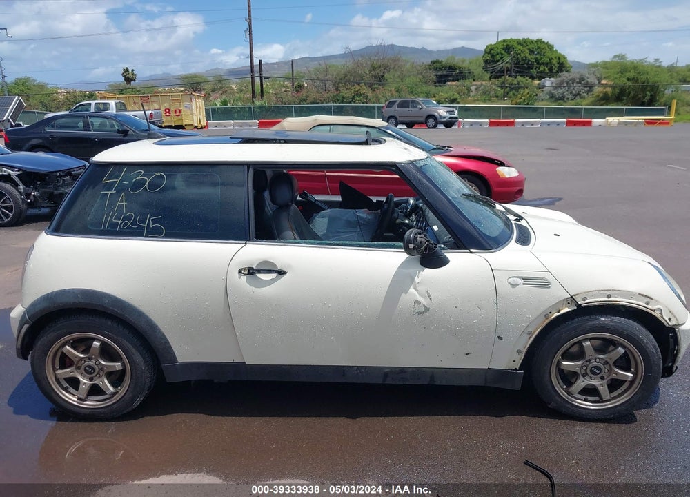 2006 MINI COOPER VIN: WMWRC33576TJ77348