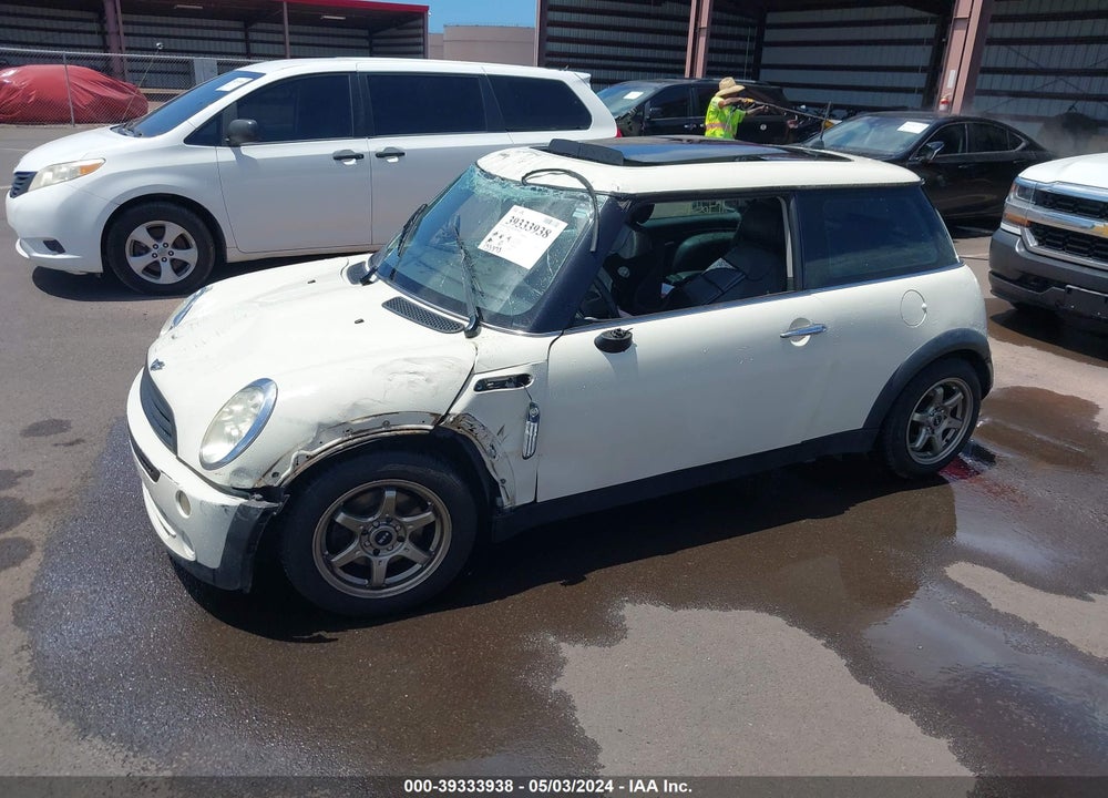 2006 MINI COOPER VIN: WMWRC33576TJ77348
