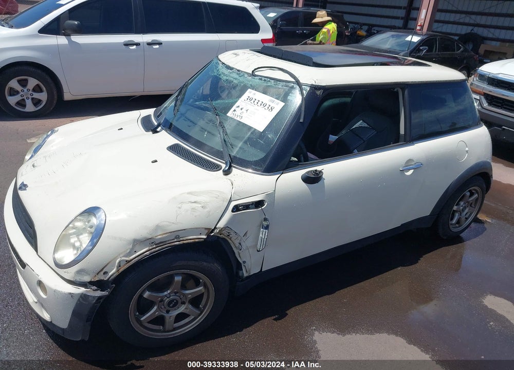 2006 MINI COOPER VIN: WMWRC33576TJ77348