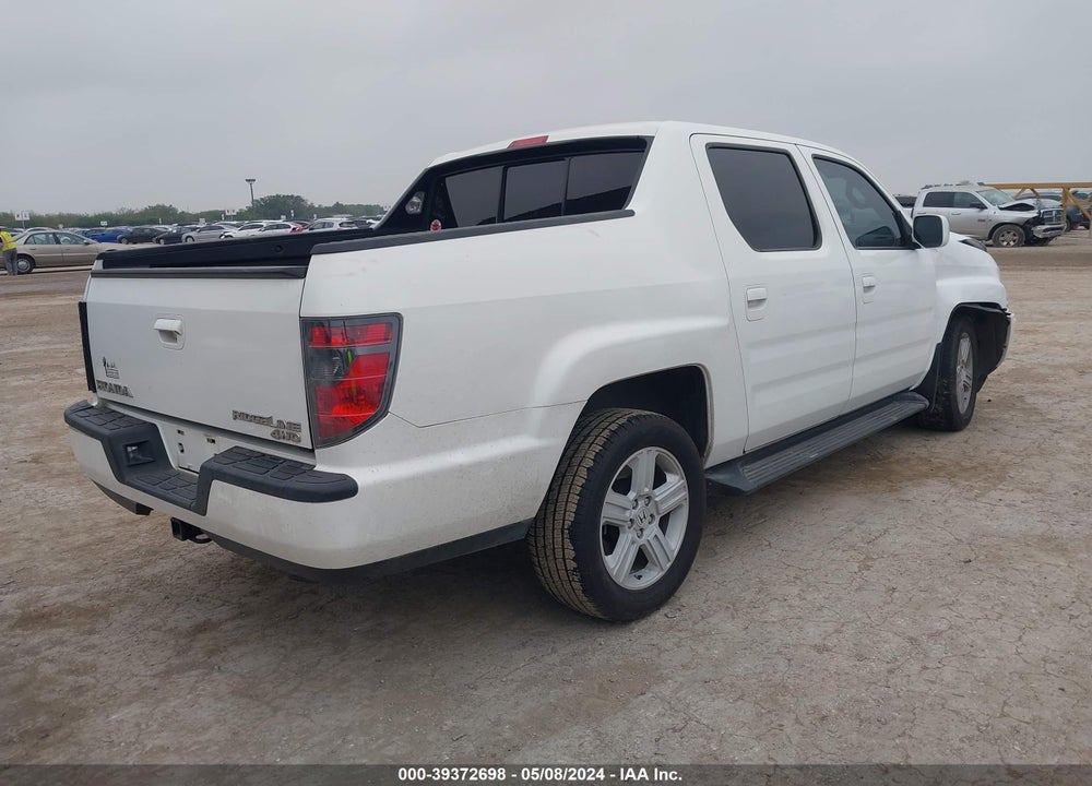 2014 HONDA RIDGELINE RTL VIN: 5FPYK1F54EB003392