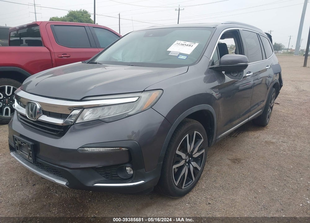 2021 HONDA PILOT 2WD TOURING 8 PASSENGER VIN: 5FNYF5H93MB016797