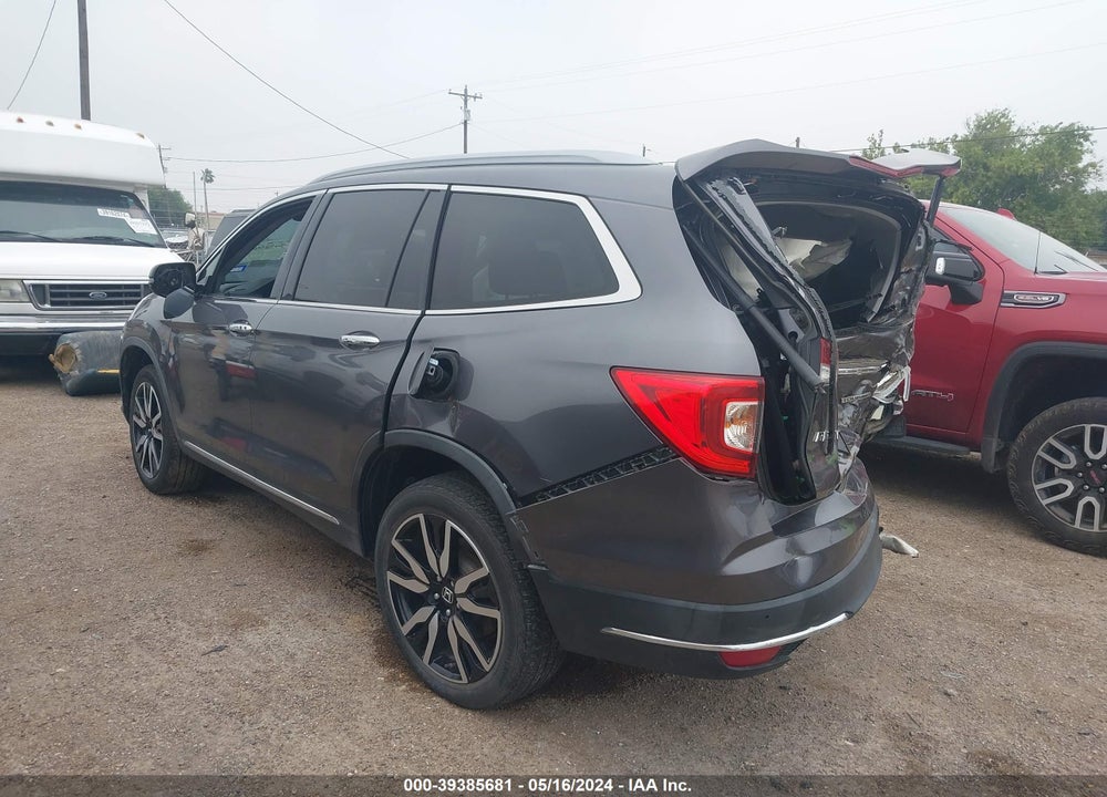 2021 HONDA PILOT 2WD TOURING 8 PASSENGER VIN: 5FNYF5H93MB016797
