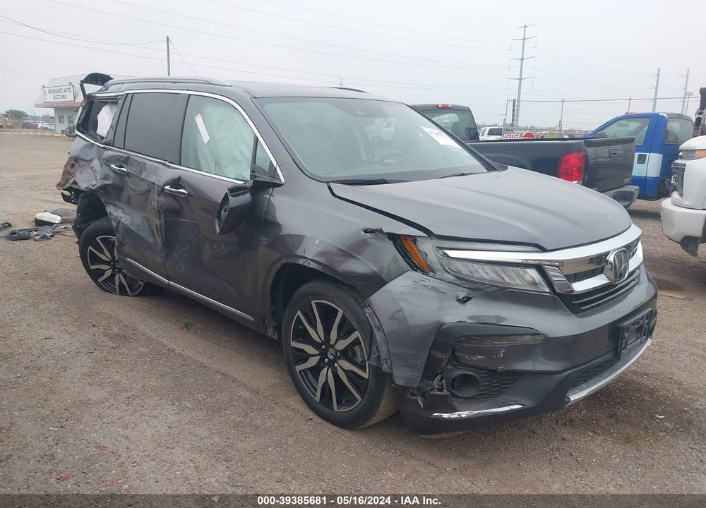 2021 HONDA PILOT 2WD TOURING 8 PASSENGER VIN: 5FNYF5H93MB016797