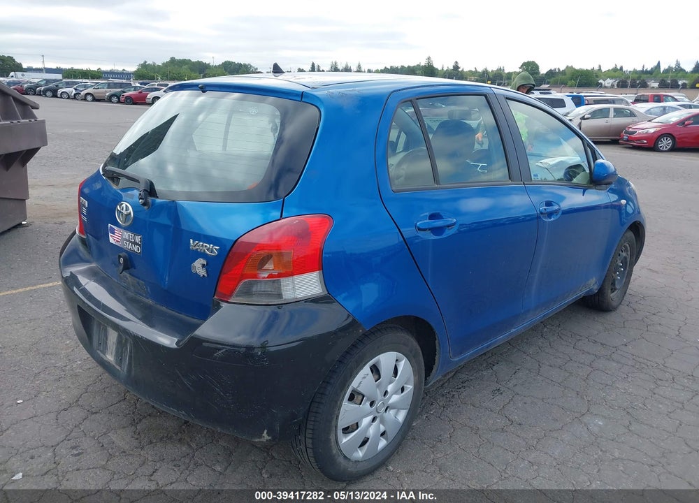 2009 TOYOTA YARIS VIN: JTDKT903495276079