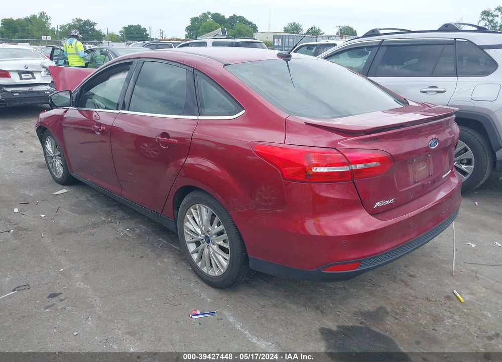 2017 FORD FOCUS TITANIUM VIN: 1FADP3J29HL336633