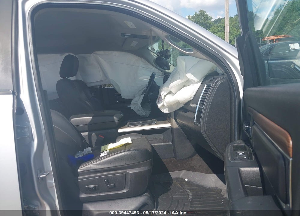 2014 RAM 1500 LAIE VIN: 1C6RR7NT0ES106394