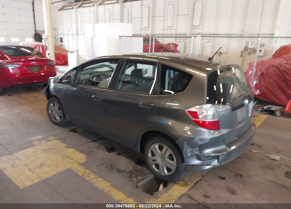 2011 HONDA FIT VIN: JHMGE8H31BC027267
