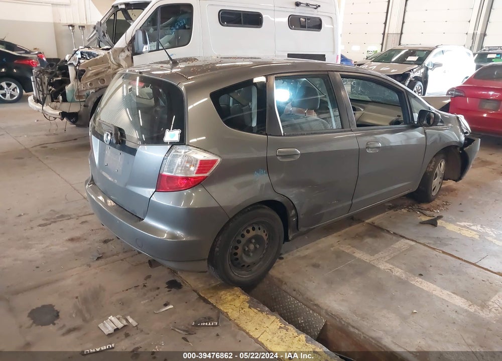 2011 HONDA FIT VIN: JHMGE8H31BC027267