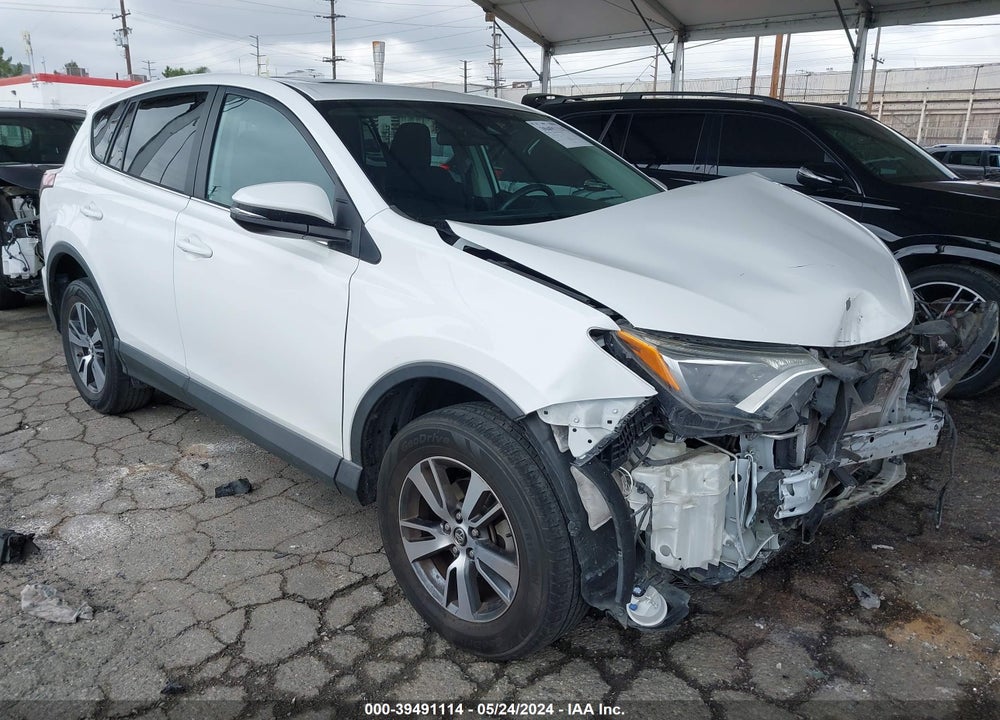 2018 TOYOTA RAV4 XLE VIN: 2T3WFREV4JW463483