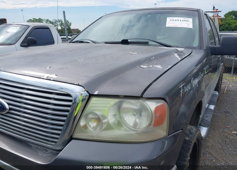 2007 FORD F-150 XLT VIN: 1FTRW14W67KD23302