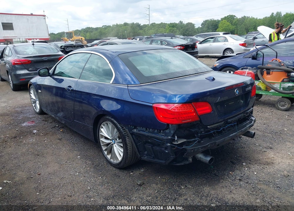 2011 BMW 335I VIN: WBADX7C5XBE580230