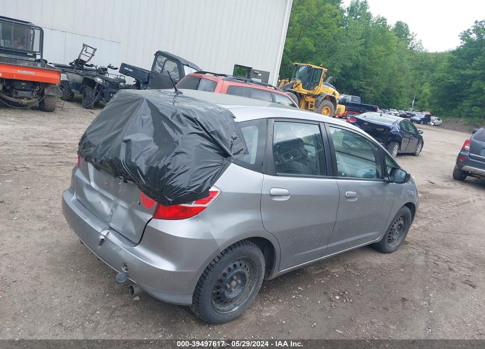 2010 HONDA FIT VIN: JHMGE8H22AC024075