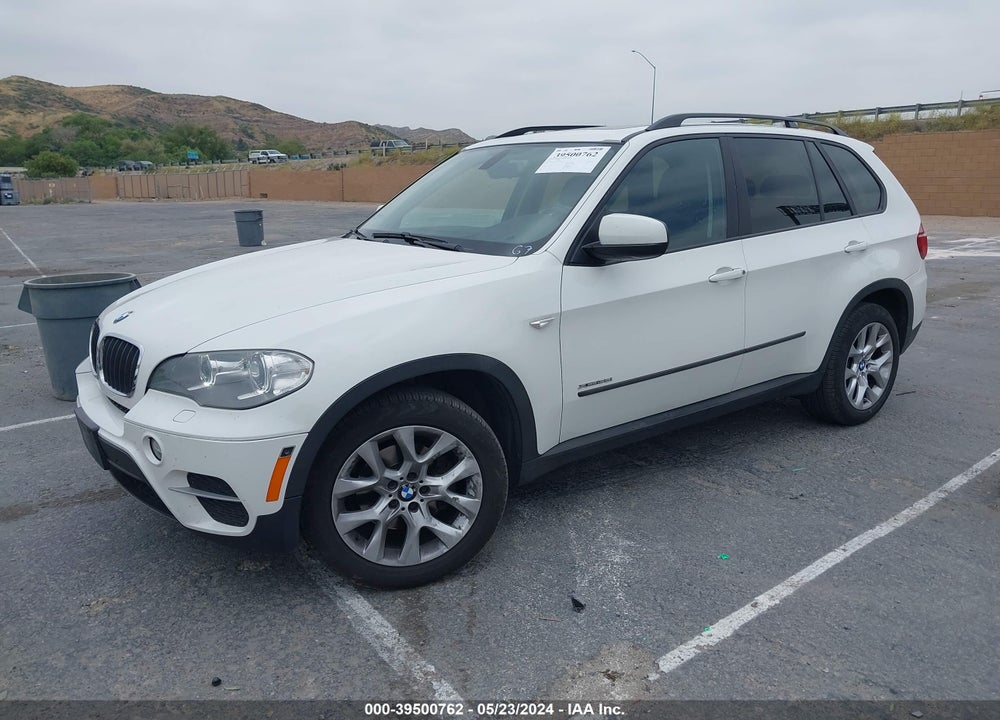 2012 BMW X5 XDRIVE35I/XDRIVE35I PREMIUM/XDRIVE35I SPORT ACTIVITY VIN: 5UXZV4C5XCL990972