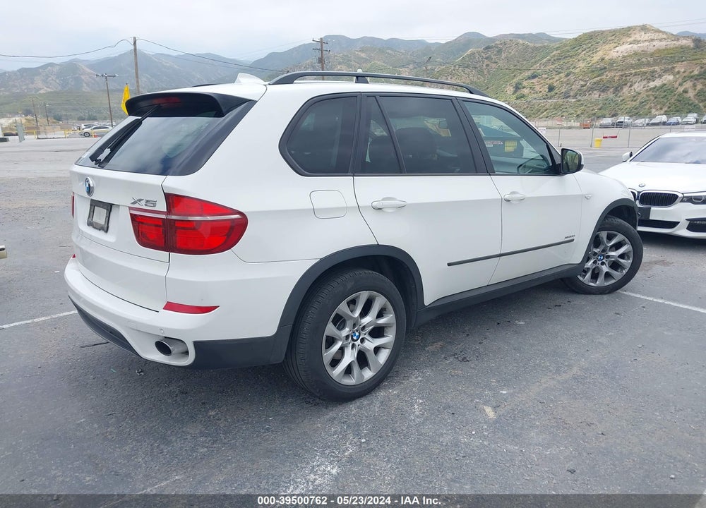 2012 BMW X5 XDRIVE35I/XDRIVE35I PREMIUM/XDRIVE35I SPORT ACTIVITY VIN: 5UXZV4C5XCL990972