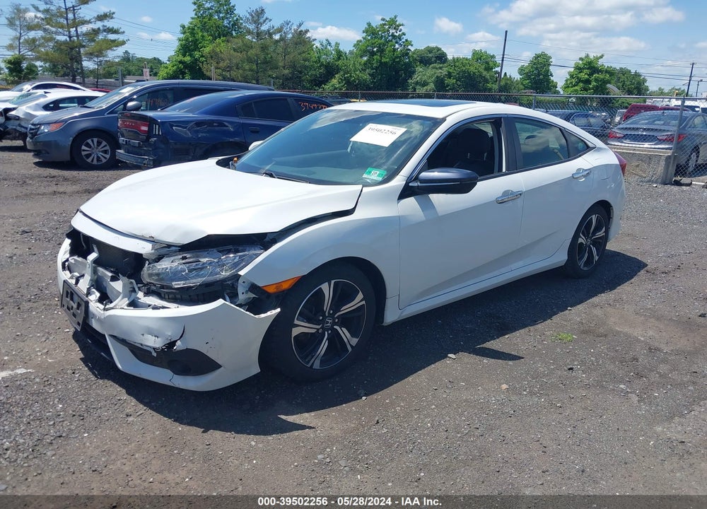 2018 HONDA CIVIC TOURING VIN: JHMFC1F99JX033843