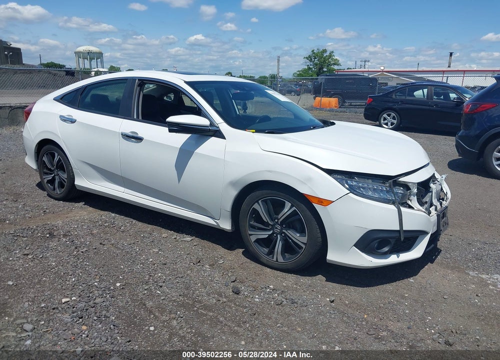 2018 HONDA CIVIC TOURING VIN: JHMFC1F99JX033843