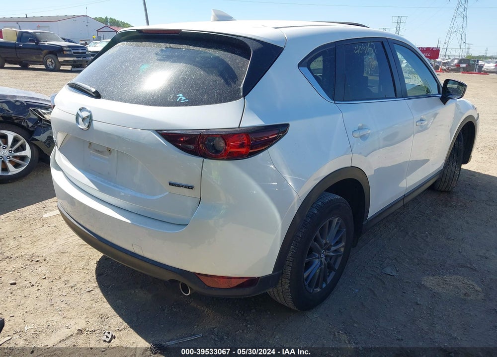 2021 MAZDA CX-5 TOURING VIN: JM3KFBCM3M0409057