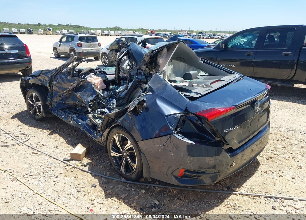 2017 HONDA CIVIC TOURING VIN: 2HGFC1F94HH631680