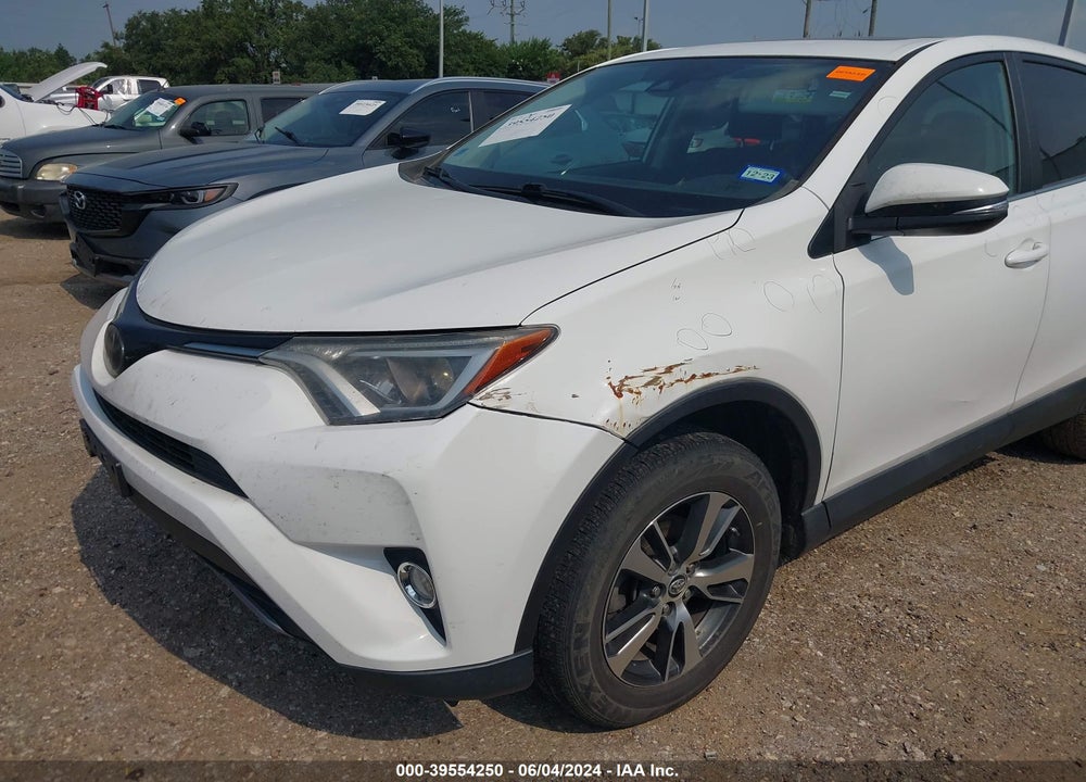 2018 TOYOTA RAV4 XLE VIN: 2T3WFREV3JW475897