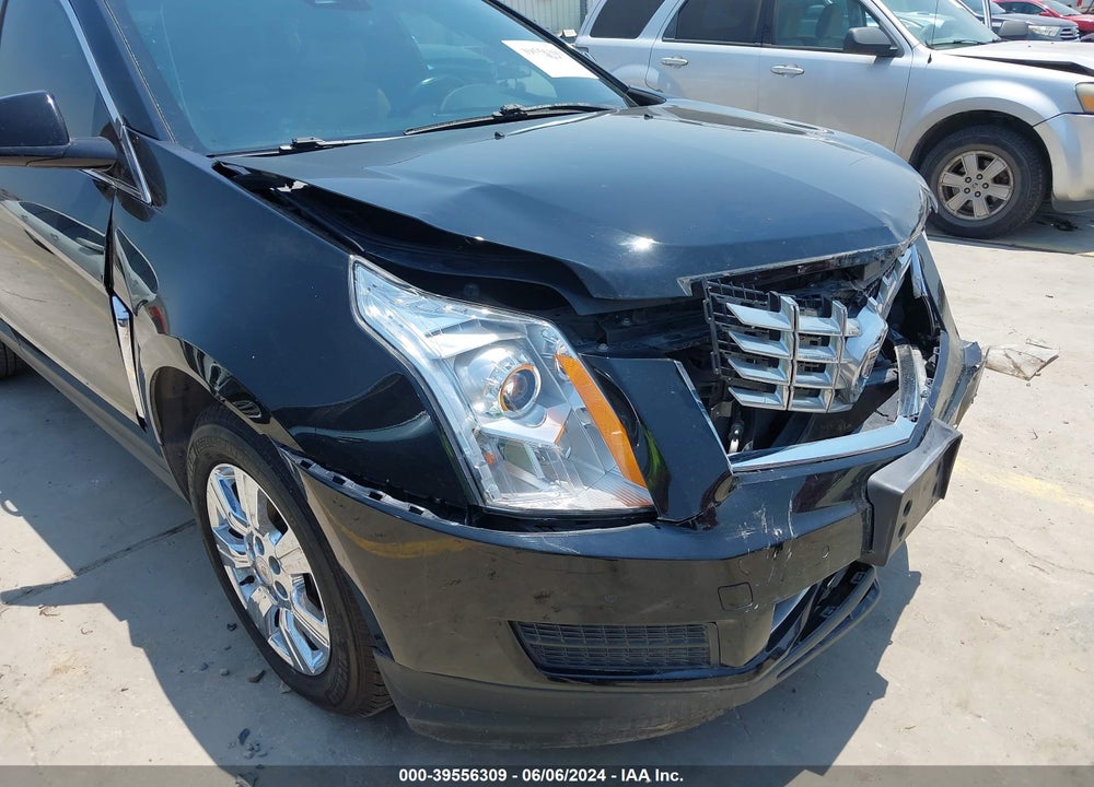 2014 CADILLAC SRX LUXURY COLLECTION VIN: 3GYFNBE36ES557130
