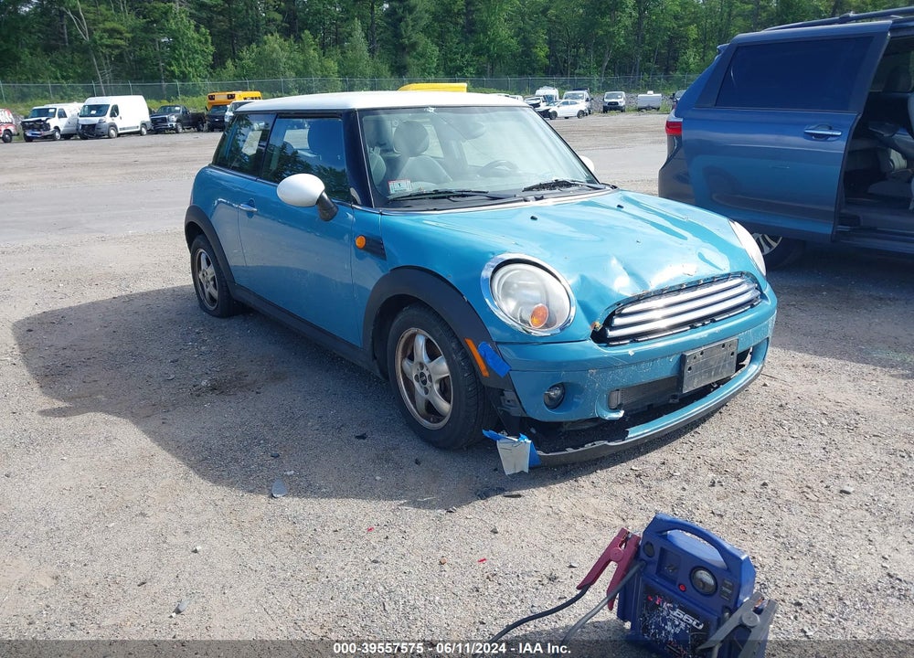 2007 MINI COOPER VIN: WMWMF33597TU63673