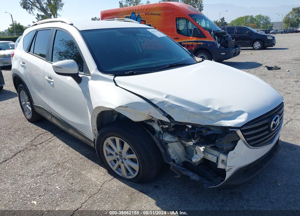 2016 MAZDA CX-5 TOURING VIN: JM3KE2CY5G0921090