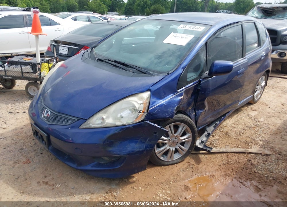 2011 HONDA FIT SPORT VIN: JHMGE8H57BC024052