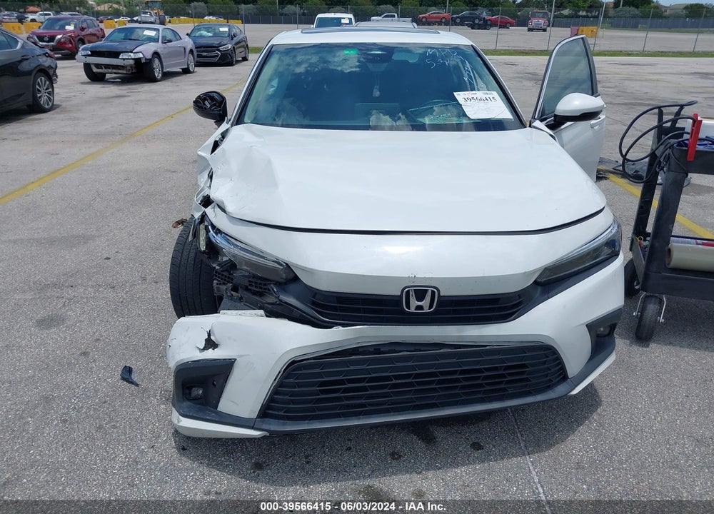 2022 HONDA CIVIC TOURING VIN: 2HGFE1F91NH304949