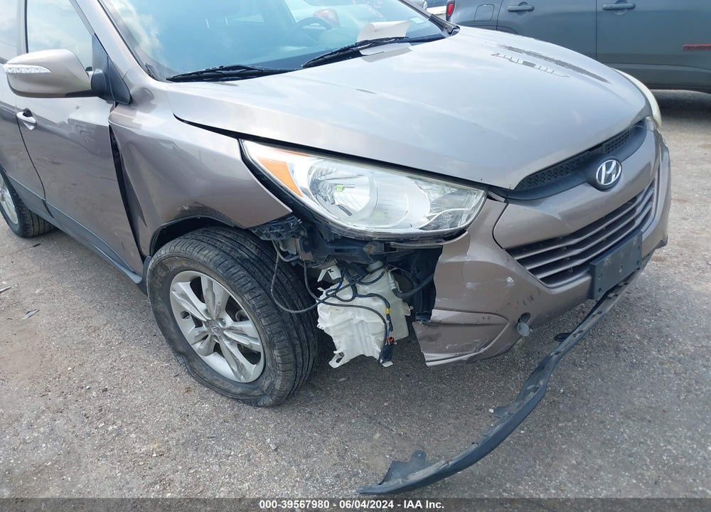 2012 HYUNDAI TUCSON GLS VIN: KM8JUCAC9CU380063