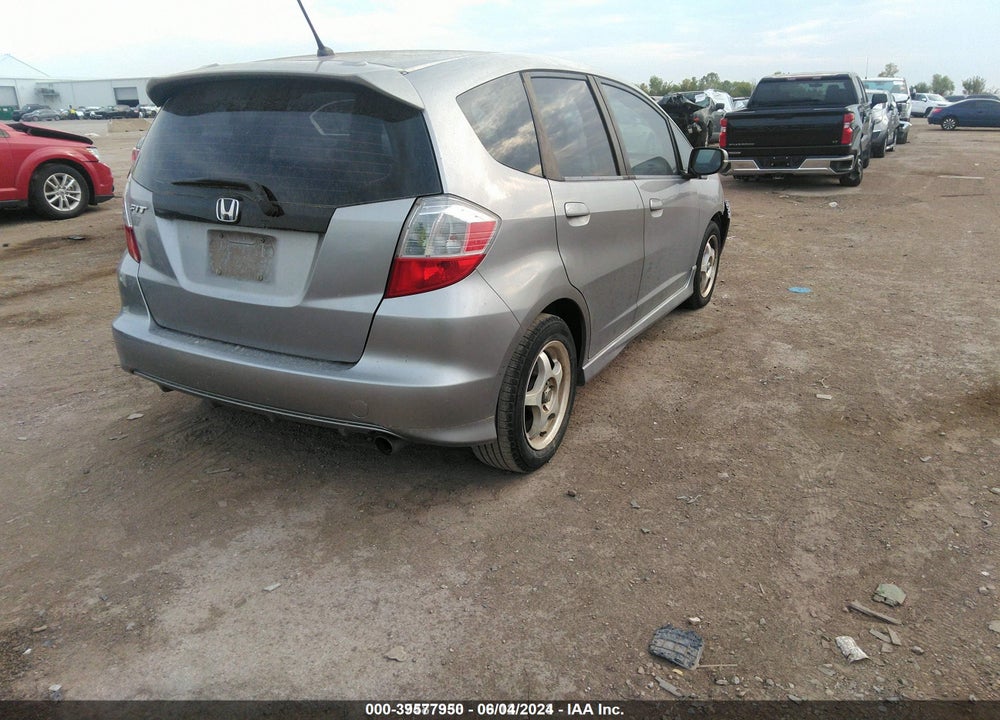 2009 HONDA FIT SPORT VIN: JHMGE88499S001573