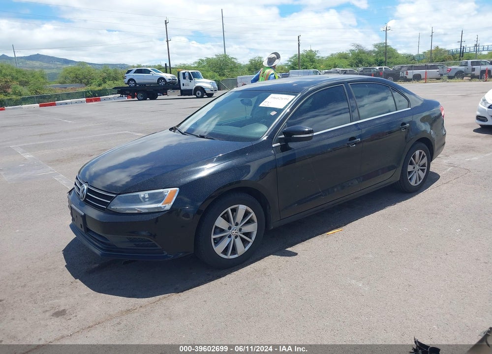 2015 VOLKSWAGEN JETTA 1.8T SE VIN: 3VWD17AJ7FM263801