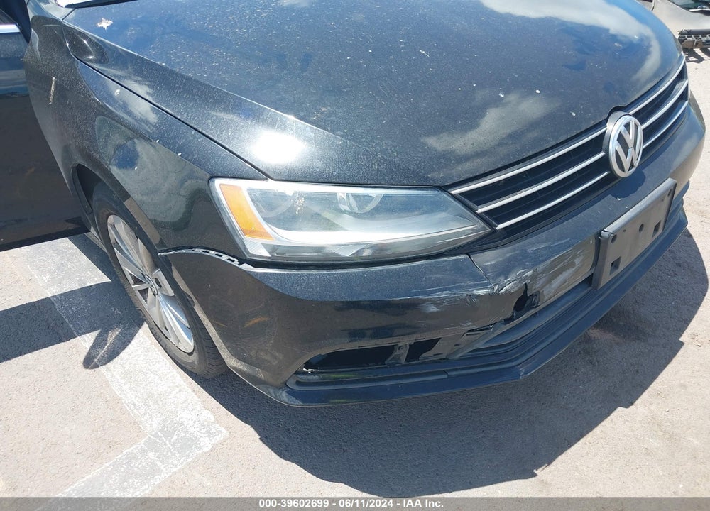 2015 VOLKSWAGEN JETTA 1.8T SE VIN: 3VWD17AJ7FM263801