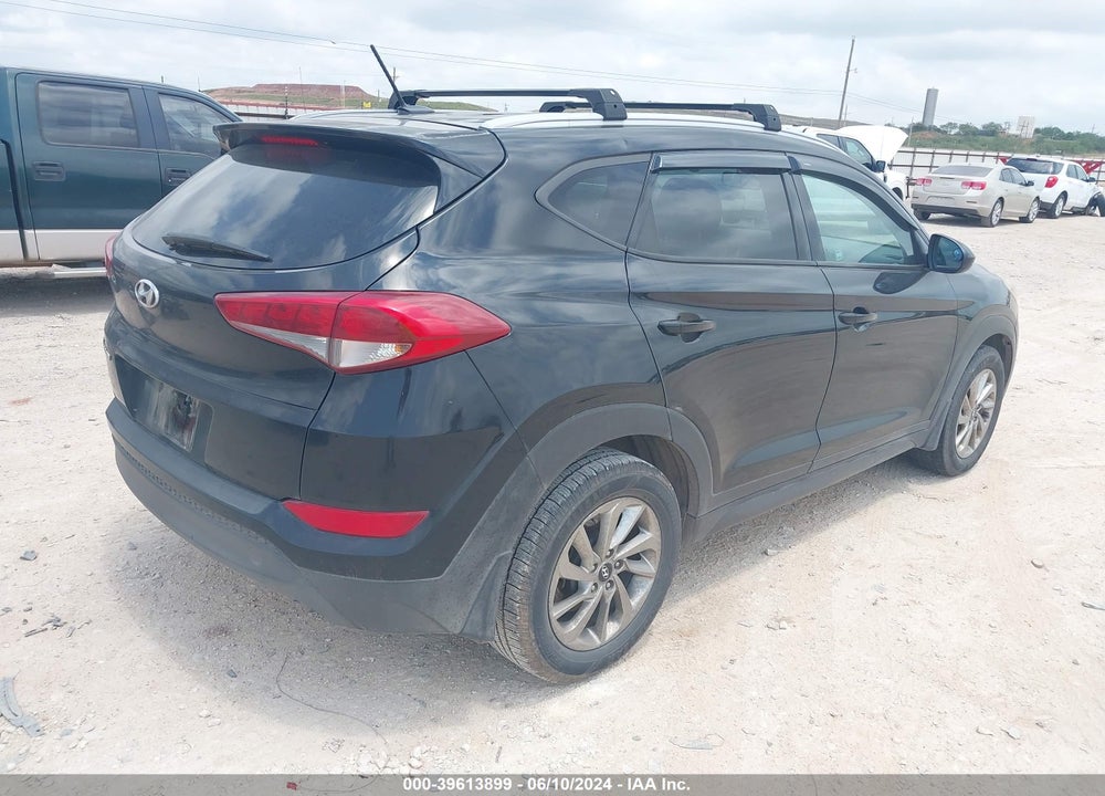 2016 HYUNDAI TUCSON SE VIN: KM8J33A43GU228054