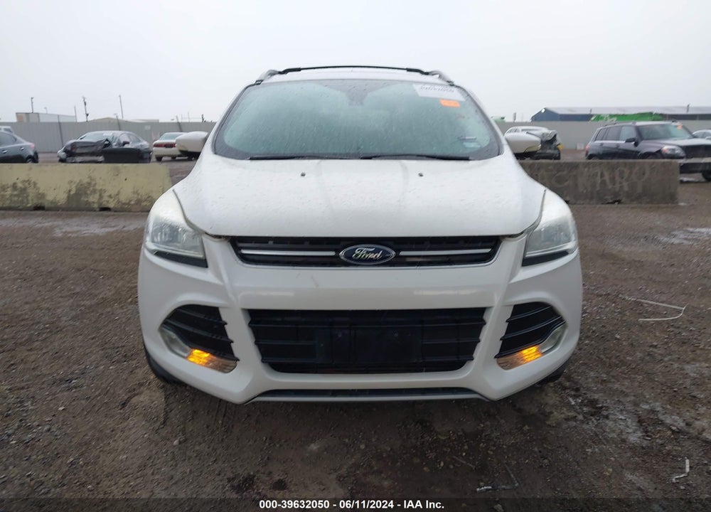 2016 FORD ESCAPE TITANIUM VIN: 1FMCU0J91GUA38463