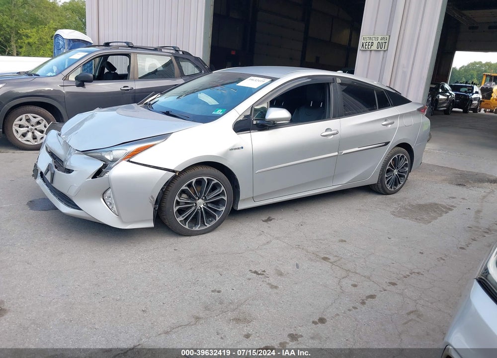 2017 TOYOTA PRIUS THREE TOURING VIN: JTDKARFUXH3034140