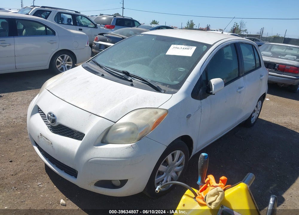 2009 TOYOTA YARIS VIN: JTDKT903495240604