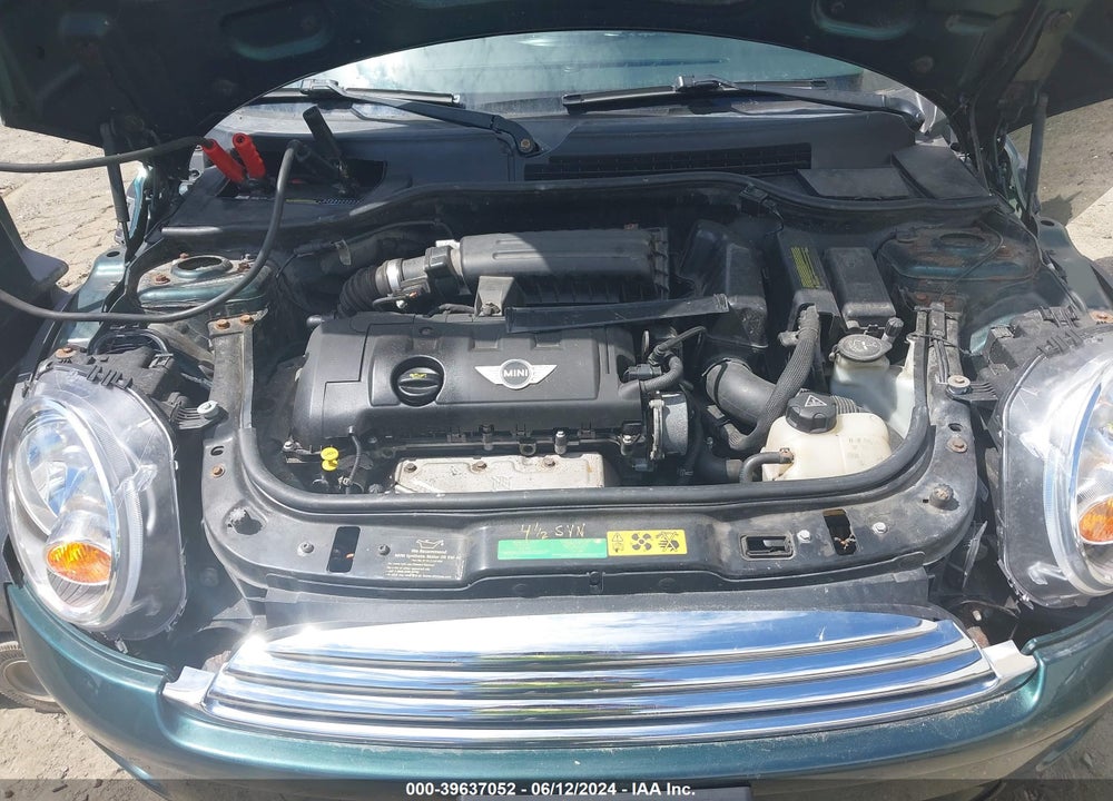 2009 MINI COOPER VIN: WMWMF33579TU75243