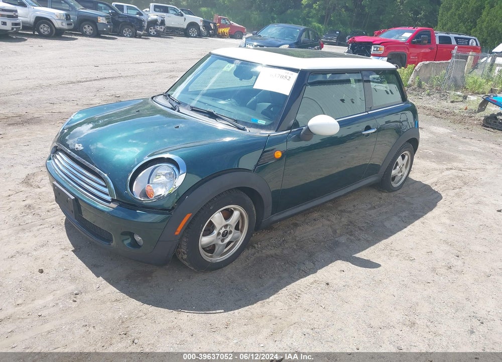 2009 MINI COOPER VIN: WMWMF33579TU75243