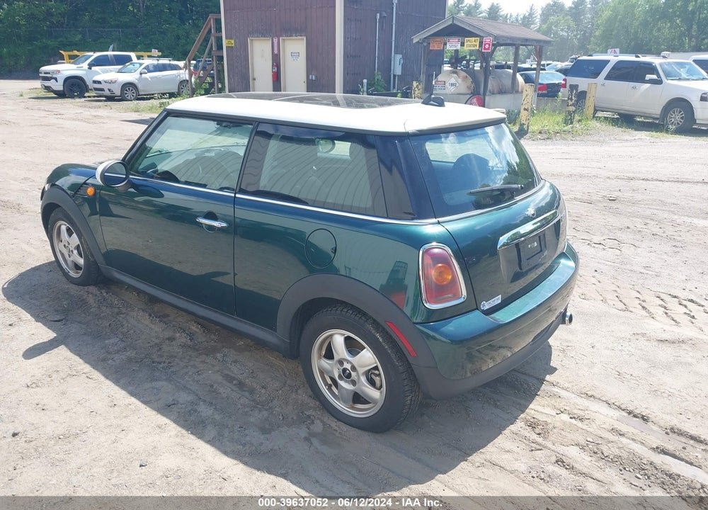 2009 MINI COOPER VIN: WMWMF33579TU75243