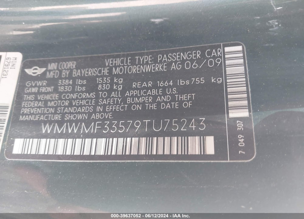 2009 MINI COOPER VIN: WMWMF33579TU75243