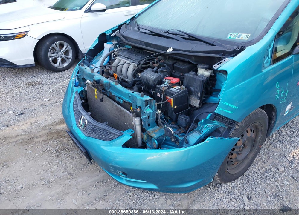 2012 HONDA FIT VIN: JHMGE8H34CC028270