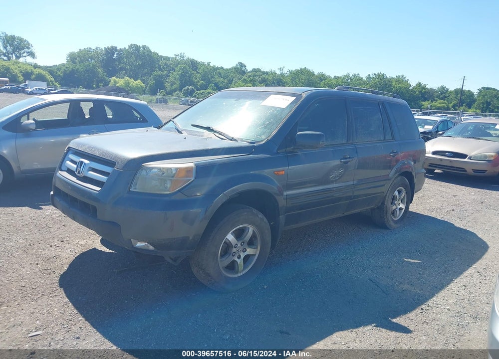 2006 HONDA PILOT EX-L VIN: 5FNYF28556B034250
