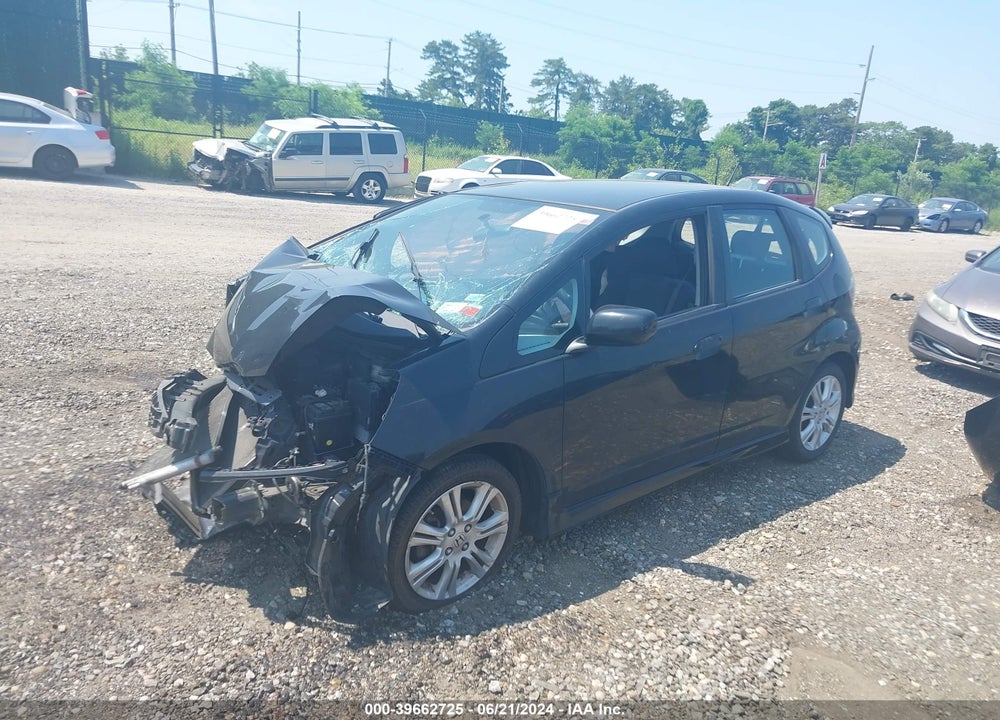 2010 HONDA FIT VIN: JHMGE8H4XAC027260