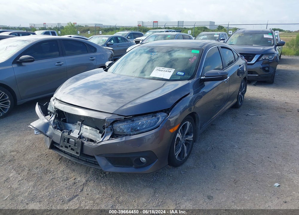 2018 HONDA CIVIC TOURING VIN: JHMFC1F91JX007270