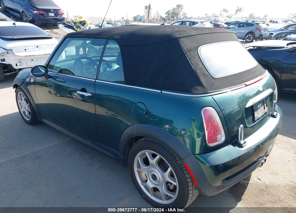 2007 MINI COOPER S VIN: WMWRH33507TL94209