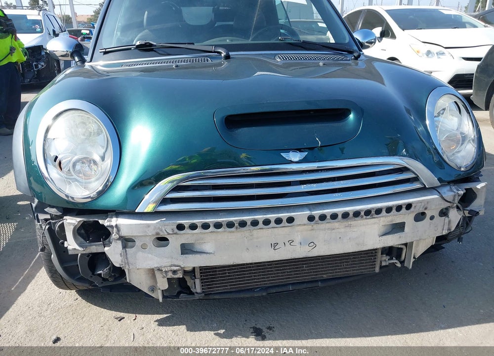 2007 MINI COOPER S VIN: WMWRH33507TL94209