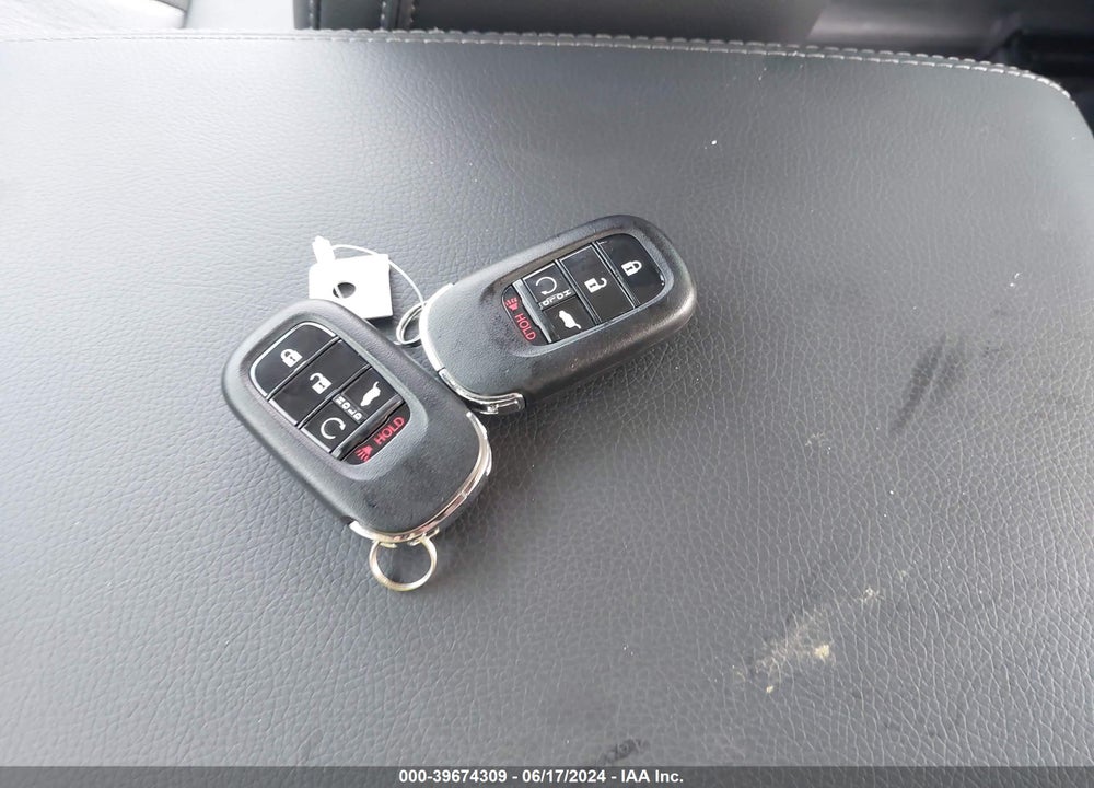2024 HONDA PILOT 2WD EX-L 7 PASSENGER VIN: 5FNYG2H57RB009450