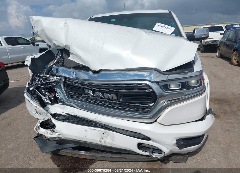 2019 RAM 1500 LIMITED 4X4 5'7 BOX VIN: 1C6SRFHT4KN873456