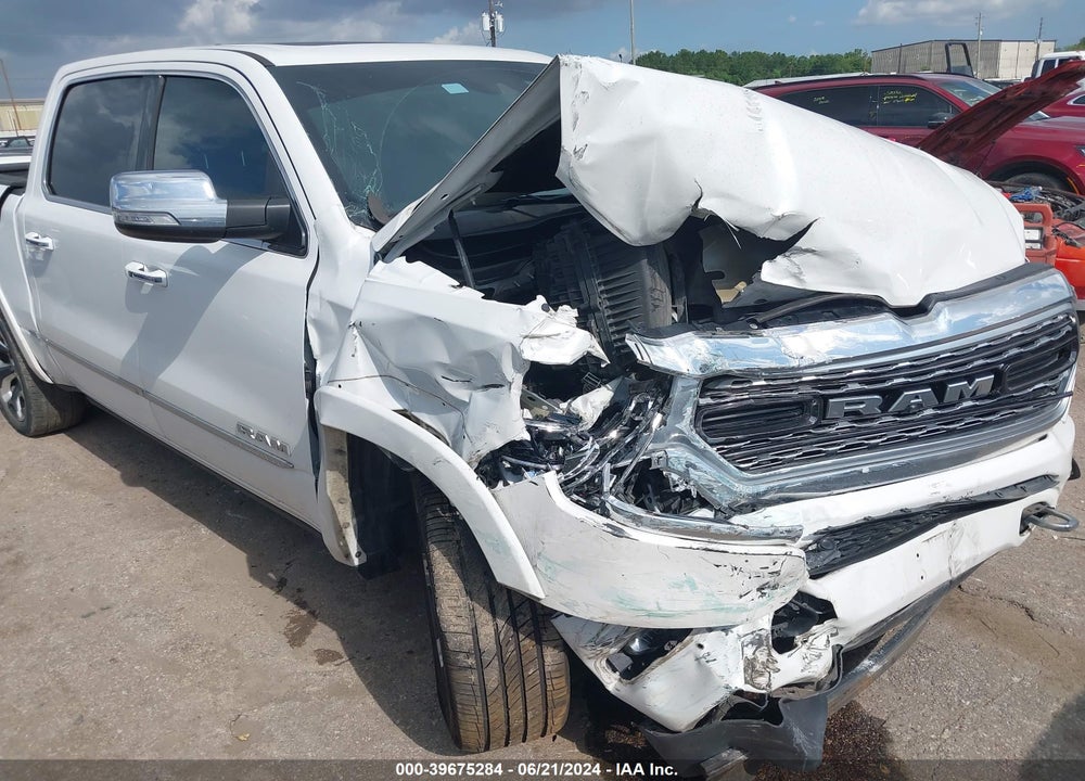 2019 RAM 1500 LIMITED 4X4 5'7 BOX VIN: 1C6SRFHT4KN873456